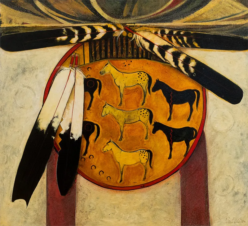 Drum adorned with feathers and horses