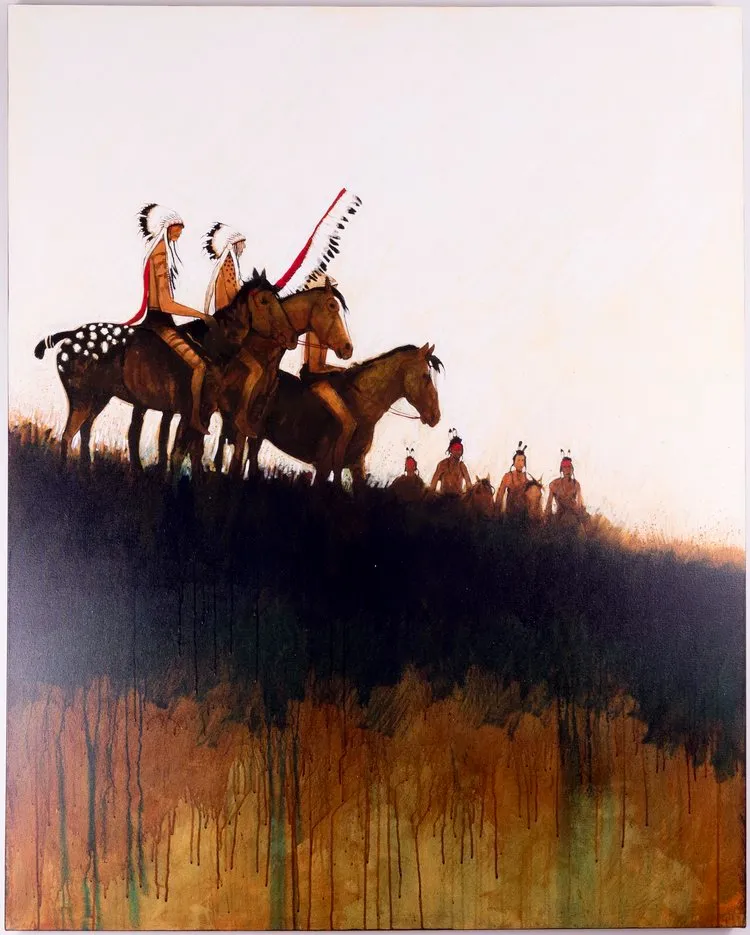 Indigenous riders on hilltop